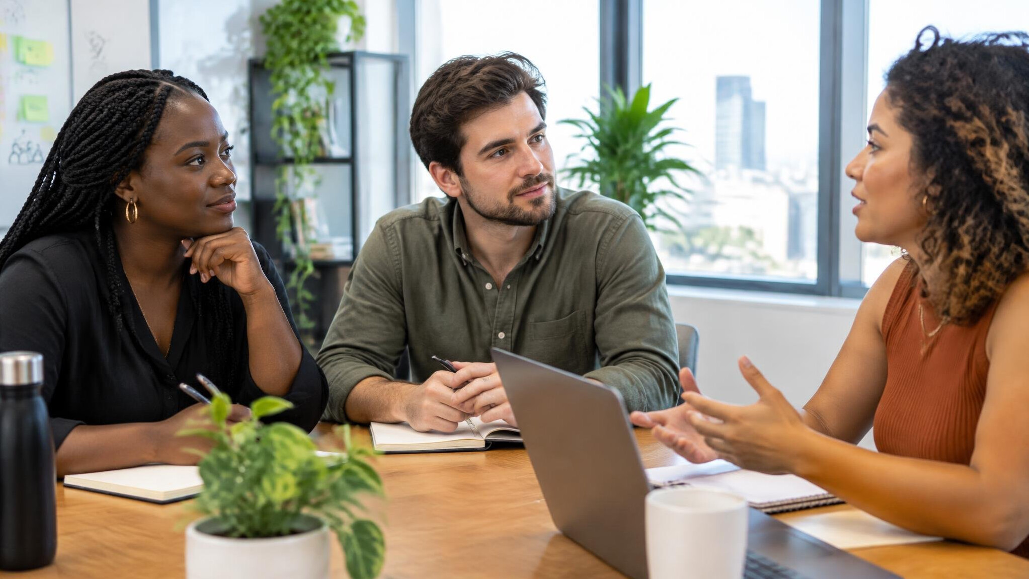 Team meeting in a modern office with people listening